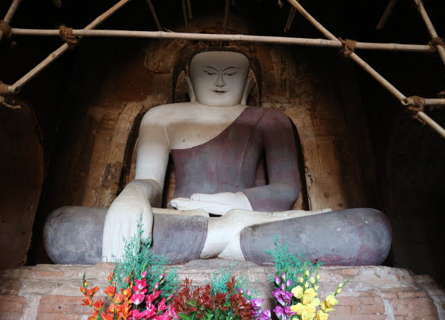 The huge sitting buddha on the lower ground.