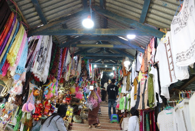 The vendors at the stairs ot Mount Popa.