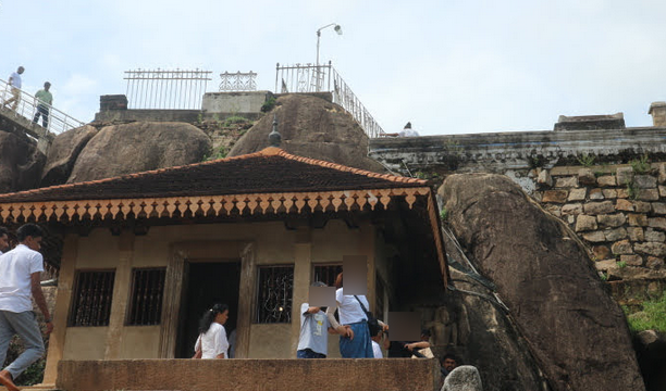 Climbing the temple.